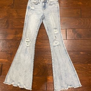 Flying monkey light washed bellbottoms size small.